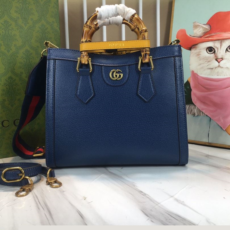 G*u*i shopping bags